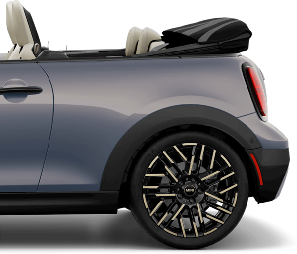 Vista lateral de la parte trasera de un MINI Cooper S Convertible, aparcado sobre una superficie blanca en blanco con su sombra debajo y nada en el fondo.