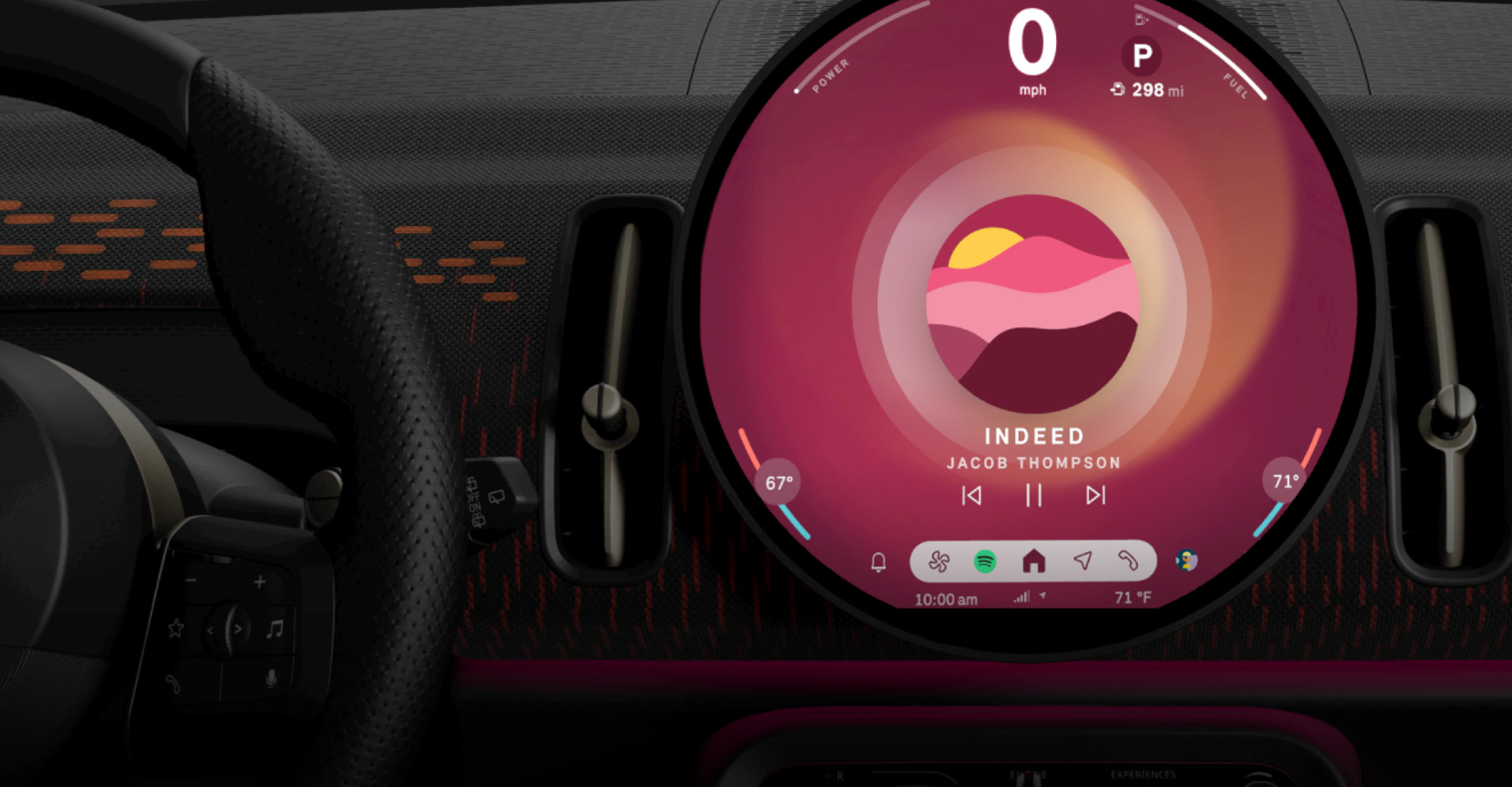 Vista de cerca de la pantalla OLED de información central redonda de 9,4" en un MINI Countryman S ALL4.