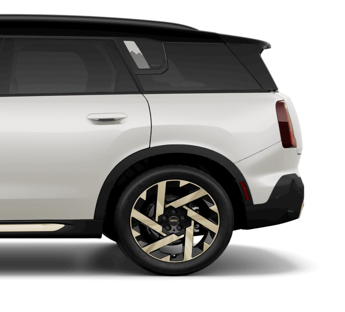 Vista lateral de un MINI Electric Hardtop 2 Door recortada desde la puerta del conductor hasta el maletero.